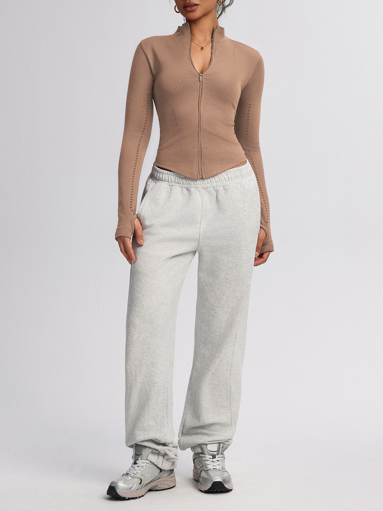 Women’s Seamless Zip-Up Sports Jacket with Thumb Holes & Textured Breathable Design